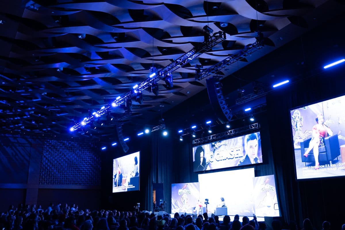 General session with truss mounted lighting and LED screens
