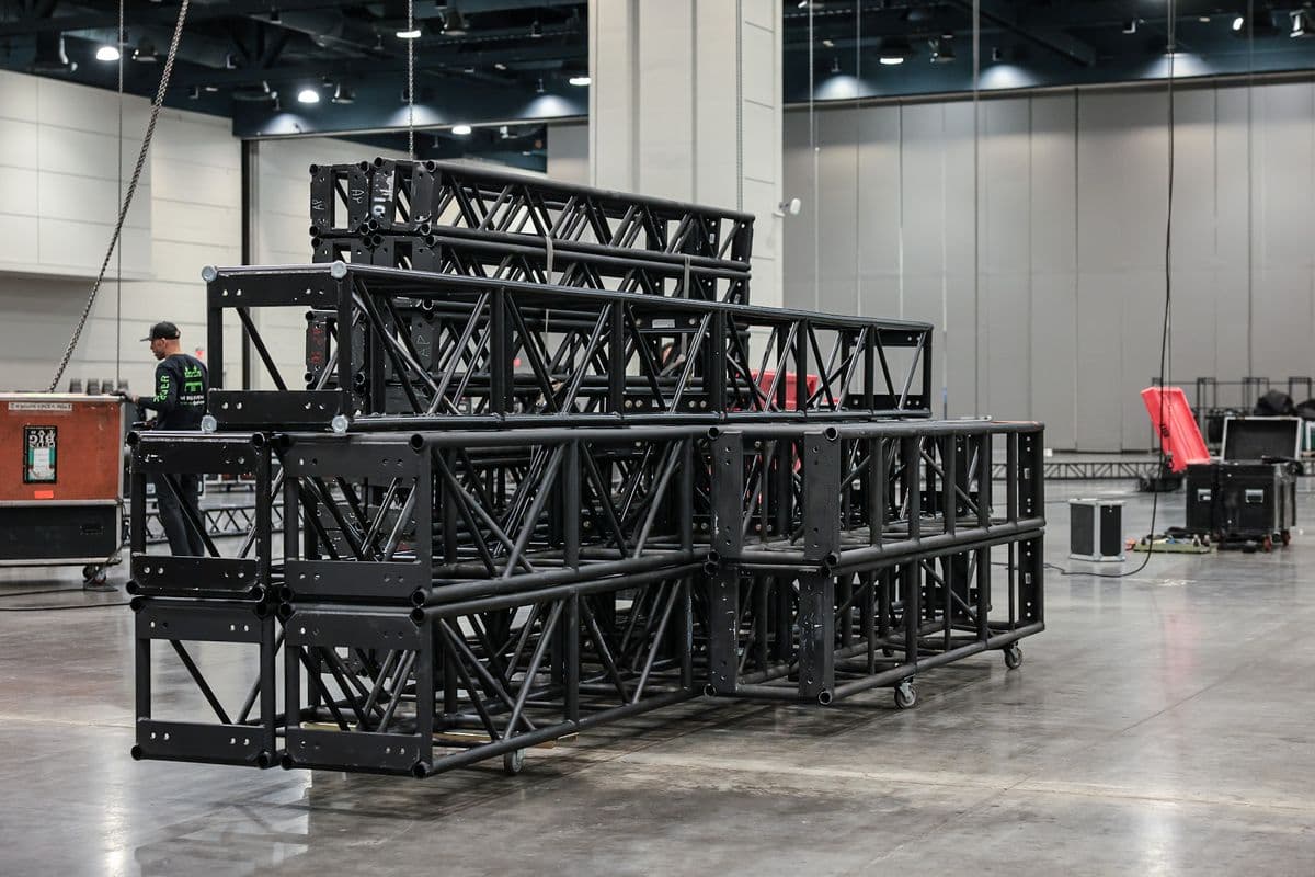 Stacked truss staged on a convention hall floor before a build